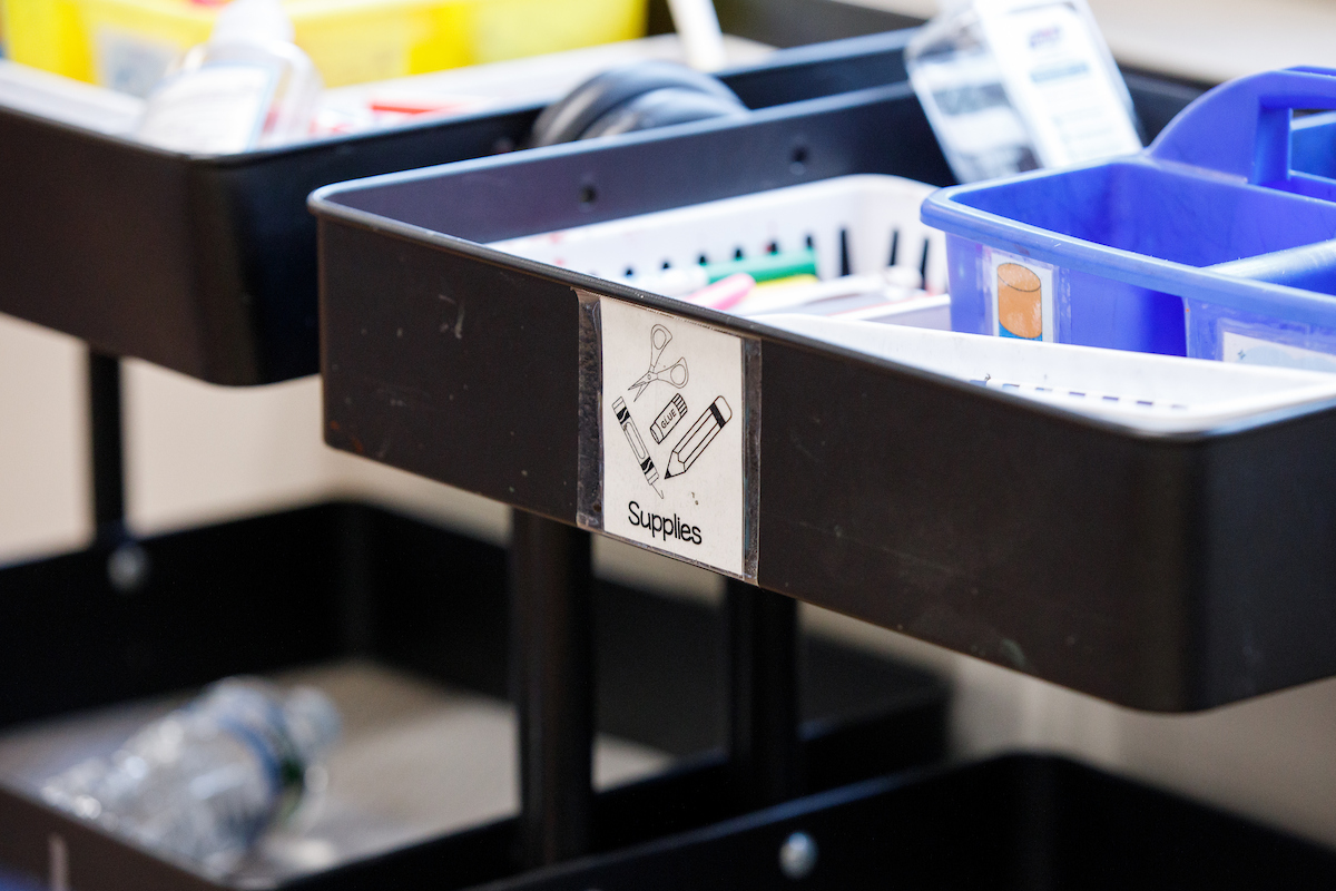 a cart with school supplies